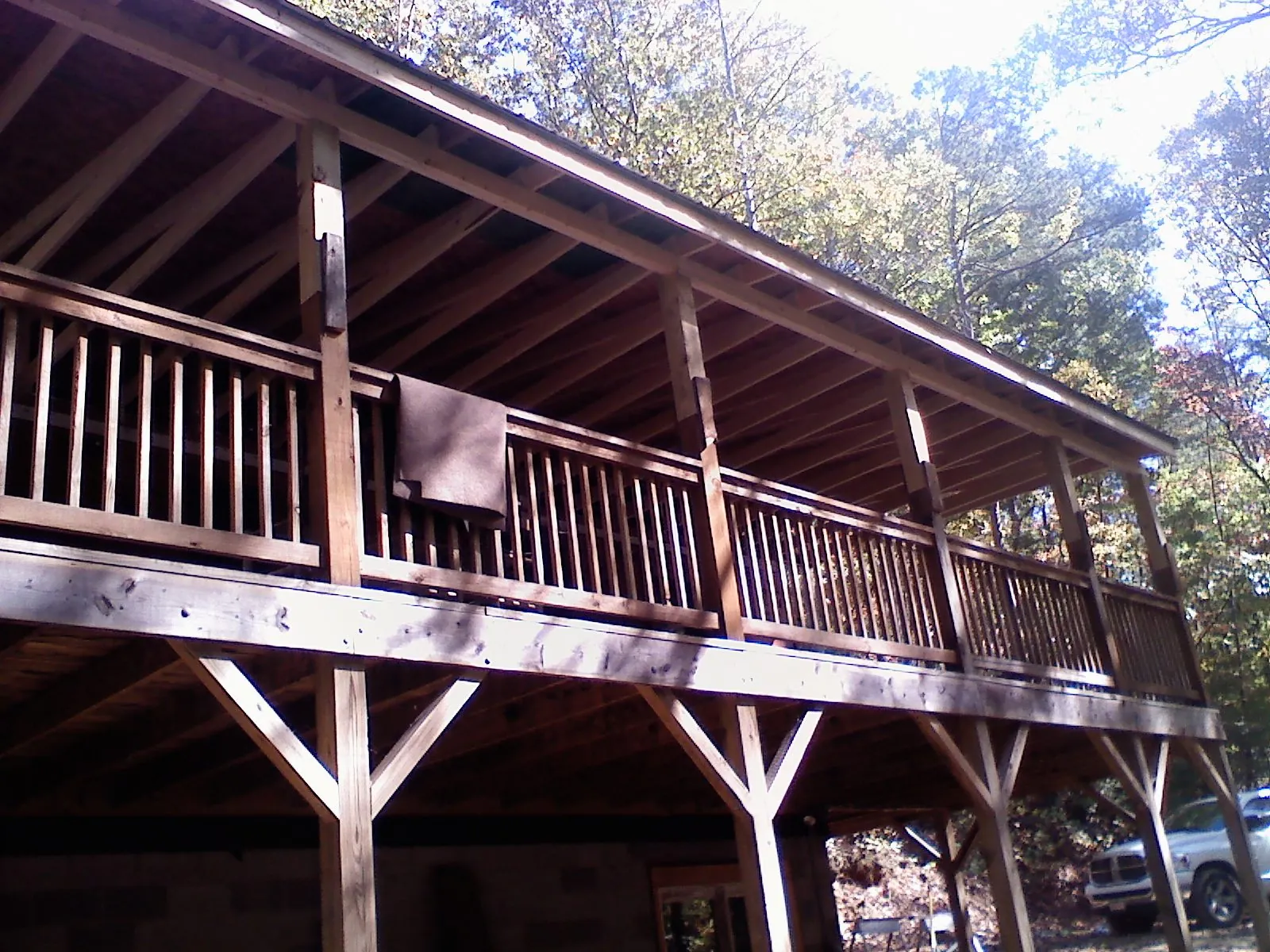 Timber framing under a new elevated porch and deck in Paris